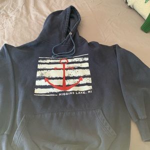 Women’s hooded sweatshirt with anchor on front.